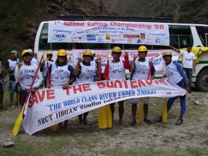 Team Paddle Nepal stands ready before Nepal’s first National Rafting Championship in 2008 — matching yellow helmets, team pride, and a growing Paddle Nepal identity already taking shape