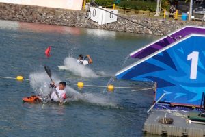 Nim Bahadur Magar paddles an ICF kayak down the obstacle ramp during the canoe slalom competition at the 2014 Asian Games in Incheon, South Korea.
