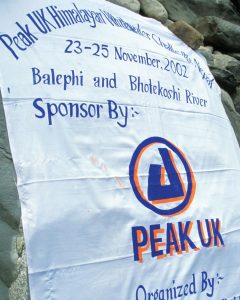 Event banner for the Peak UK Himalayan Whitewater Challenge 2002 on the Bhote Koshi and Balephi Rivers, Nepal.