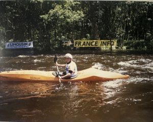 Nim Bahadur Magar paddling an unfamiliar plastic race kayak during practice at the World Championships in Treignac, France