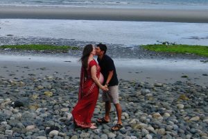 Kelly, wearing a traditional sari, and Nim Magar awaiting the birth of their son in 2010.